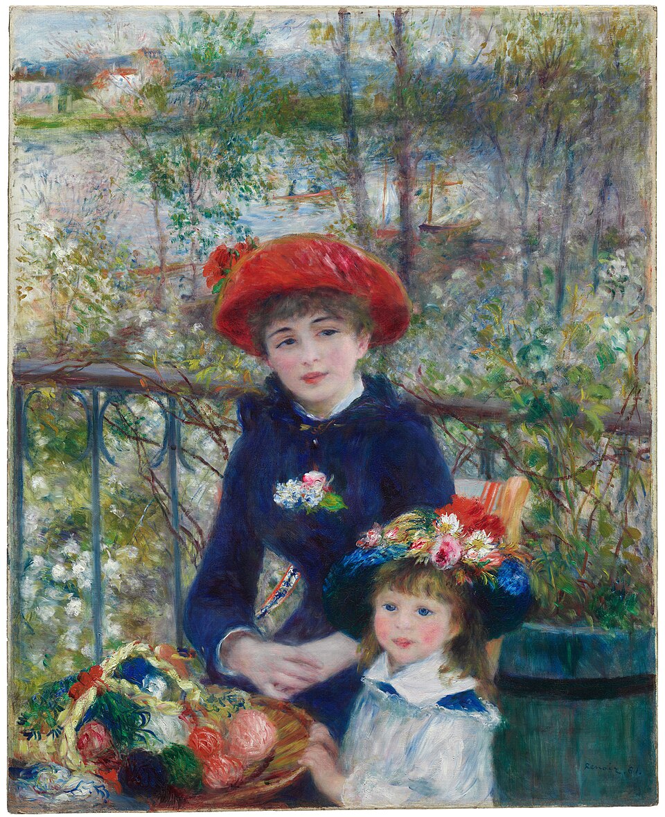 Two sisters sitting together on a leafy terrace